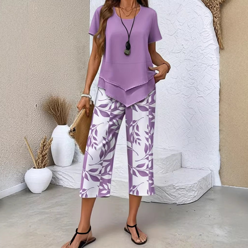 👗 SADA 50% POPUSTA 🌿 Ležerni komplet tunike s okruglim izrezom i slojevitih hlača širokih nogavica – Asimetrični rub, print i prozračne hlače ✨