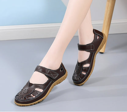 💞👡【Veľkosti 36-42】Dámske elegantné a pohodlné ploché ortopedické sandále, vyrobené z mäkkej pravej kože, pohodlné a priedušné.