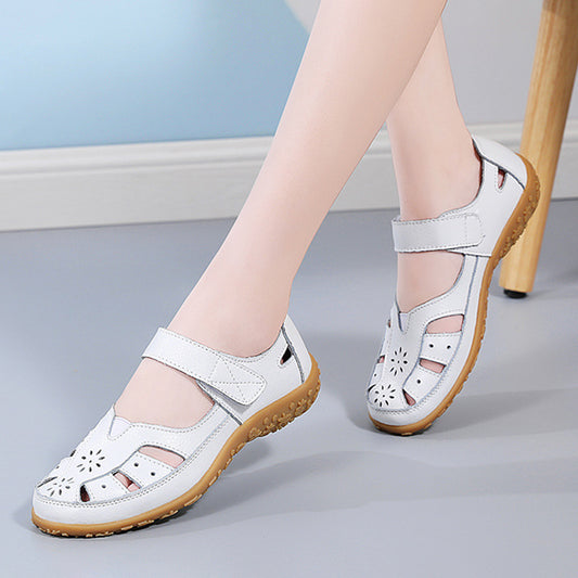 💞👡【Veľkosti 36-42】Dámske elegantné a pohodlné ploché ortopedické sandále, vyrobené z mäkkej pravej kože, pohodlné a priedušné.