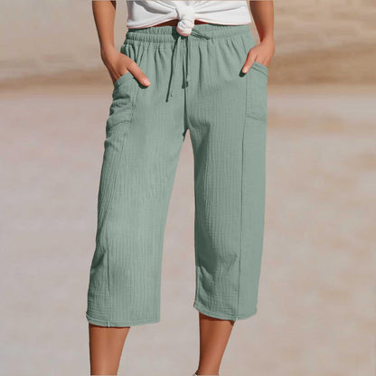 💖【40KG-100KG】👖👖Ženske jednobojne plisirane capri hlače od pamuka i lana - hladne i prozračne, laskaju obliku nogu, elegantne i ležerne